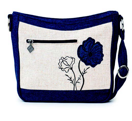 Meet the Jak's Fantasia St-Martin. This charming crossbody bag has a gorgeous floral print that adds personality to any outfit. Built with a zippered organizer pocket it's designed to keep your essentials safe.