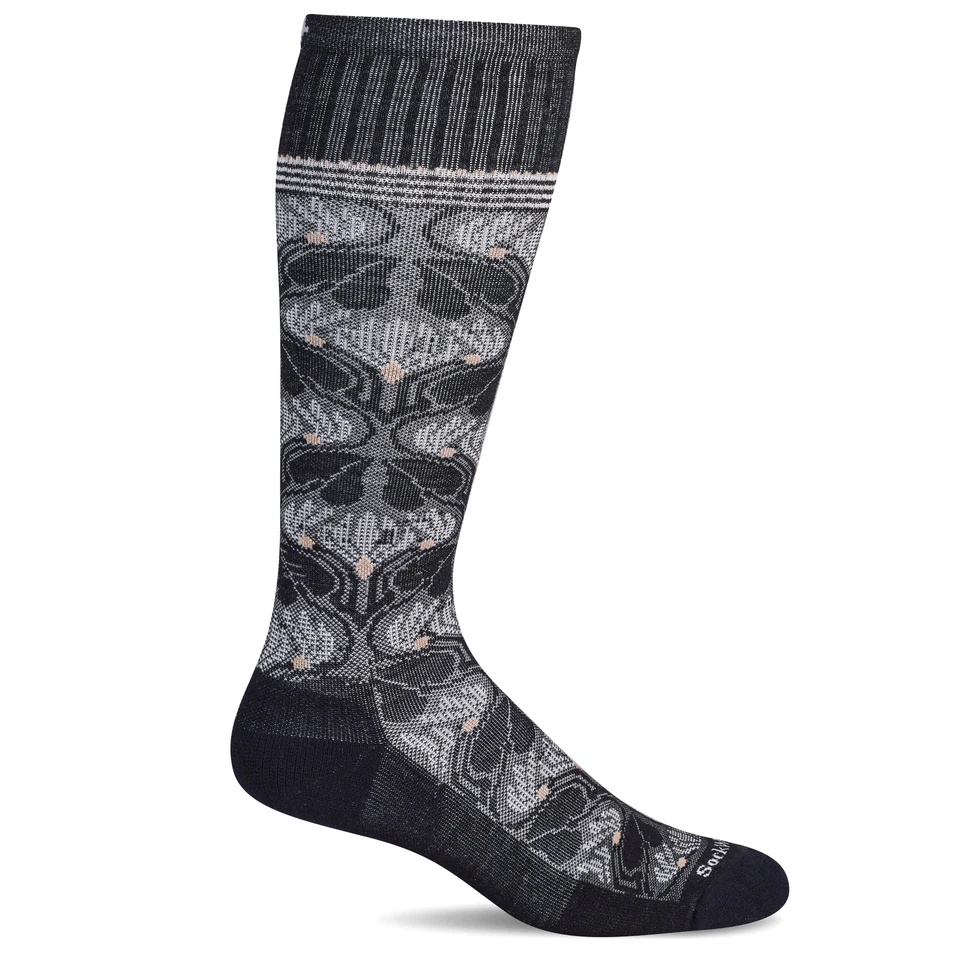 Experience exceptional comfort and support with the Sockwell Floral Tapestry - Black socks. Crafted from a premium blend of 32% Merino wool and 31% rayon from bamboo, these socks offer natural breathability and moisture management. The moderate 15-20mmHg compression enhances circulation, reducing fatigue during long days. Featuring an ultra-light cushion sole, they provide gentle padding without bulk, perfect for all-day wear. With added stretch nylon and spandex, these socks ensure a snug, flexible fit tha