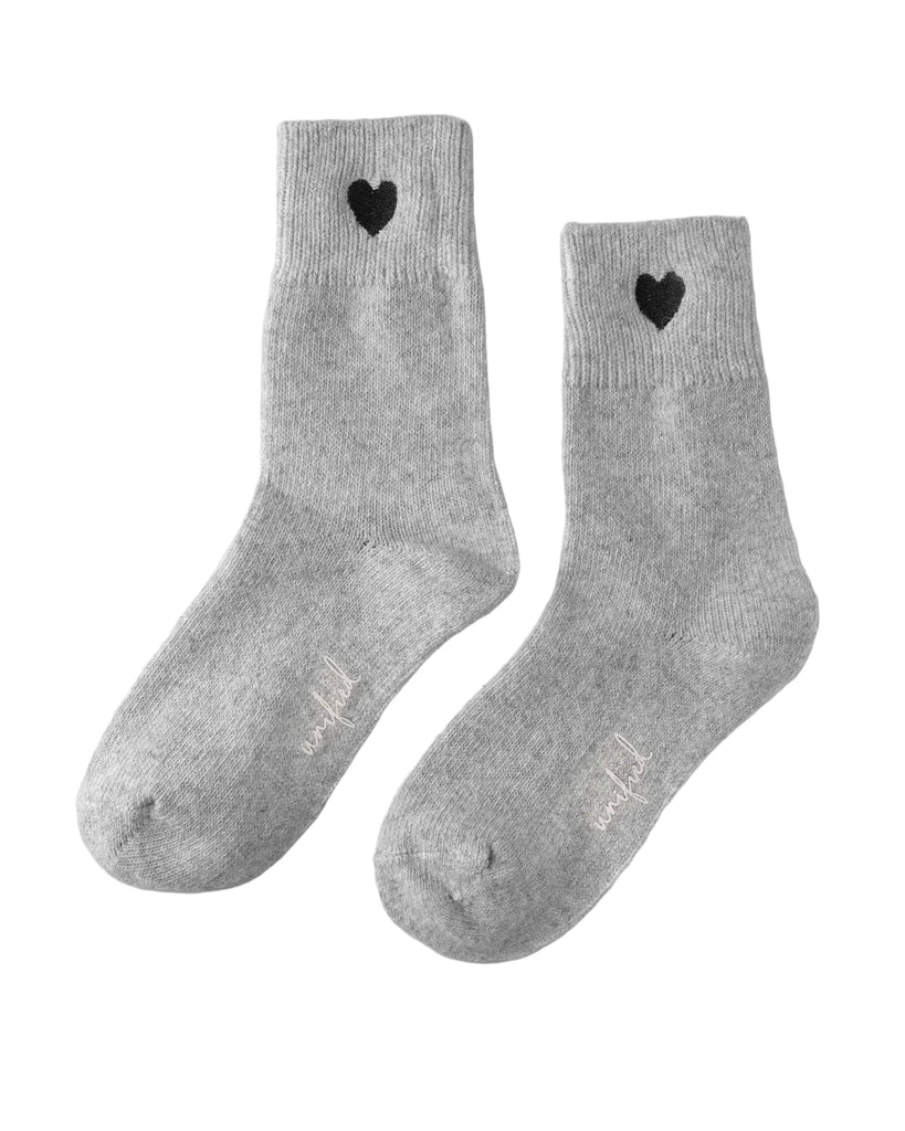 Our beloved Sweater Sock gets a romantic upgrade with an extended fit and charming embroidered heart detail. Luxuriously soft and toasty warm, this elevated version delivers the same signature wide-ribbed comfort while hugging your feet in plush perfection. The added length makes it ideal for layering with your favorite boots or enjoying during cozy downtime.