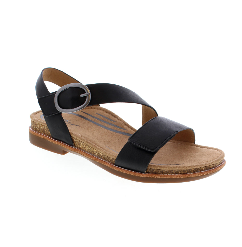 The Aetrex Tamara black sandal delivers comprehensive foot support in a versatile casual style. Its microfiber footbed features anti-bacterial and odor-control properties, paired with high arch support, pronation control, and metatarsal support. The cork and memory foam midsole provides responsive cushioning, while the leather upper and rubber outsole ensure durability. True-to-size fit accommodates narrow to medium or medium-wide feet for all-day summer comfort.
