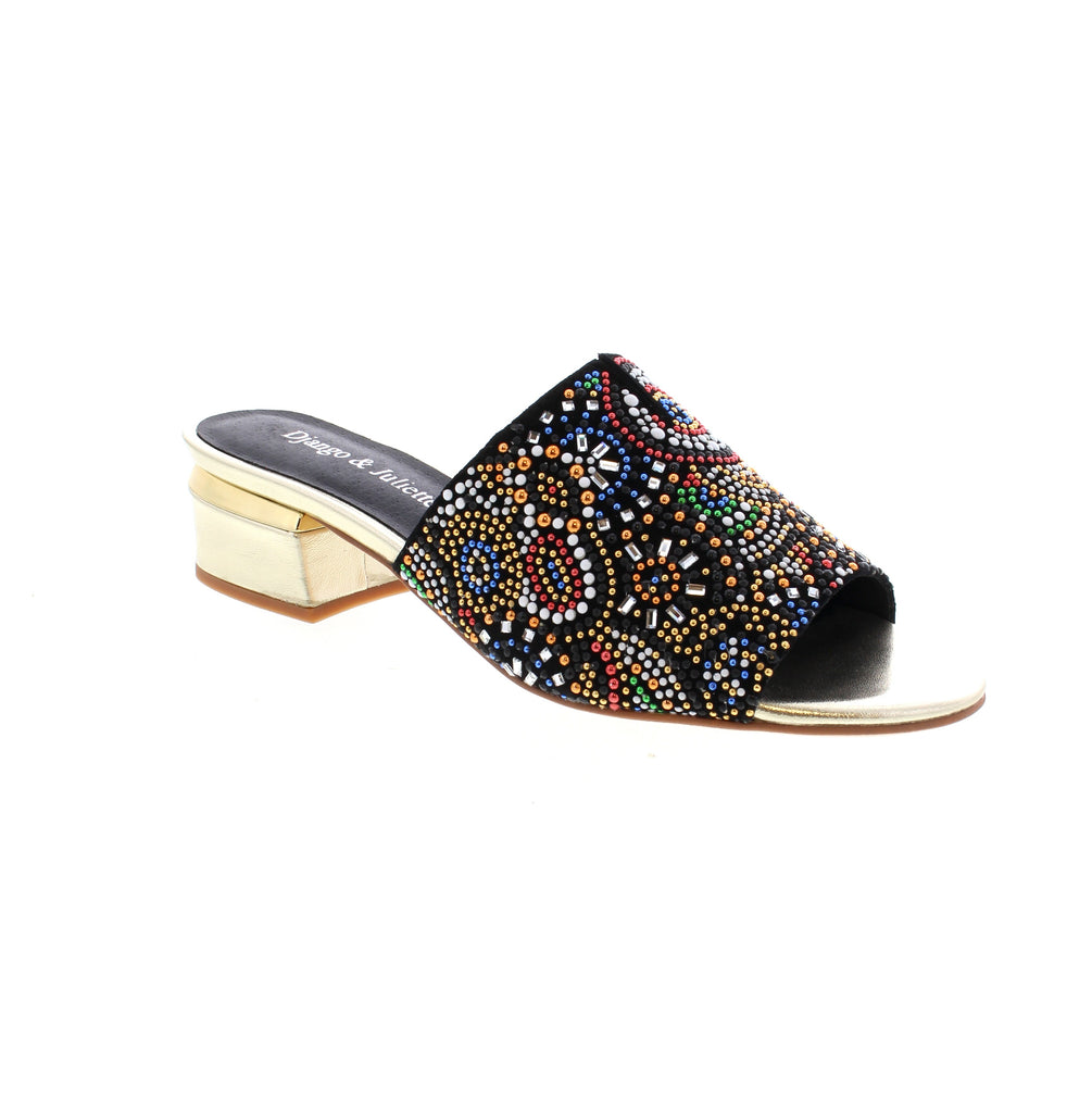 This elegant slip-on heeled sandal combines premium suede and leather construction with intricate beaded embellishments that elevate any ensemble. The Django &amp; Juliette Tammy delivers sophisticated style through meticulous craftsmanship, offering a refined finishing touch for both casual and formal occasions.