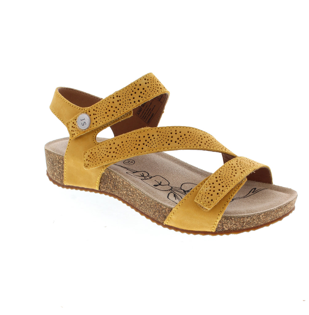 The Josef Seibel Tonga 78 delivers casual comfort in a sophisticated yellow palette. Crafted from perforated nubuck, the upper promotes breathability while maintaining durability. The microfiber footbed provides a soft surface underfoot, while the cork midsole offers natural shock absorption. A subtle wedge heel and light arch support work together to reduce strain during everyday wear. The velcro closure ensures easy on-and-off convenience.
