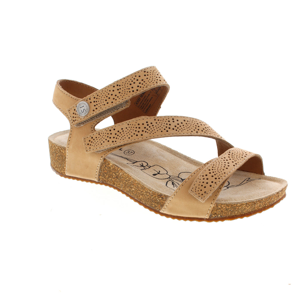 The Josef Seibel Tonga 78 delivers casual comfort in a sophisticated beige palette. Crafted from perforated nubuck, the upper promotes breathability while maintaining durability. The microfiber footbed provides a soft surface underfoot, while the cork midsole offers natural shock absorption. A subtle wedge heel and light arch support work together to reduce strain during everyday wear. The velcro closure ensures easy on-and-off convenience.