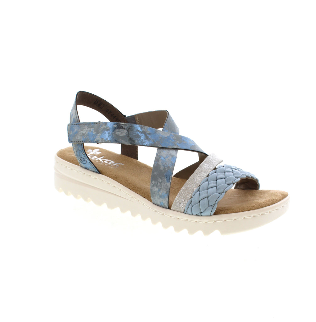 Engineered for all-day comfort, these Rieker V4663-12 wedge sandals combine functionality with sophisticated style. The sandal features manmade leather construction and narrow decorative straps for visual appeal. The elastic insert ensures effortless wear, while the shock-absorbing, lightweight wedge sole provides exceptional support and stability—perfect for extended wear without compromising on fashion-forward design.