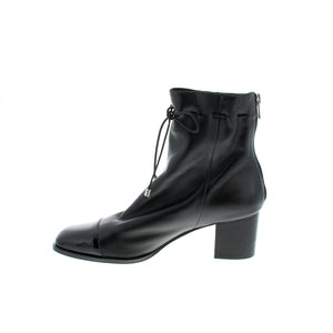 These Django & Juliette Valina ankle boots are crafted from high-quality leather for a chic, elevated look. With a comfortable block heel, laced upper and a back zipper, they easily transition from your 9-5 to evening outings. 