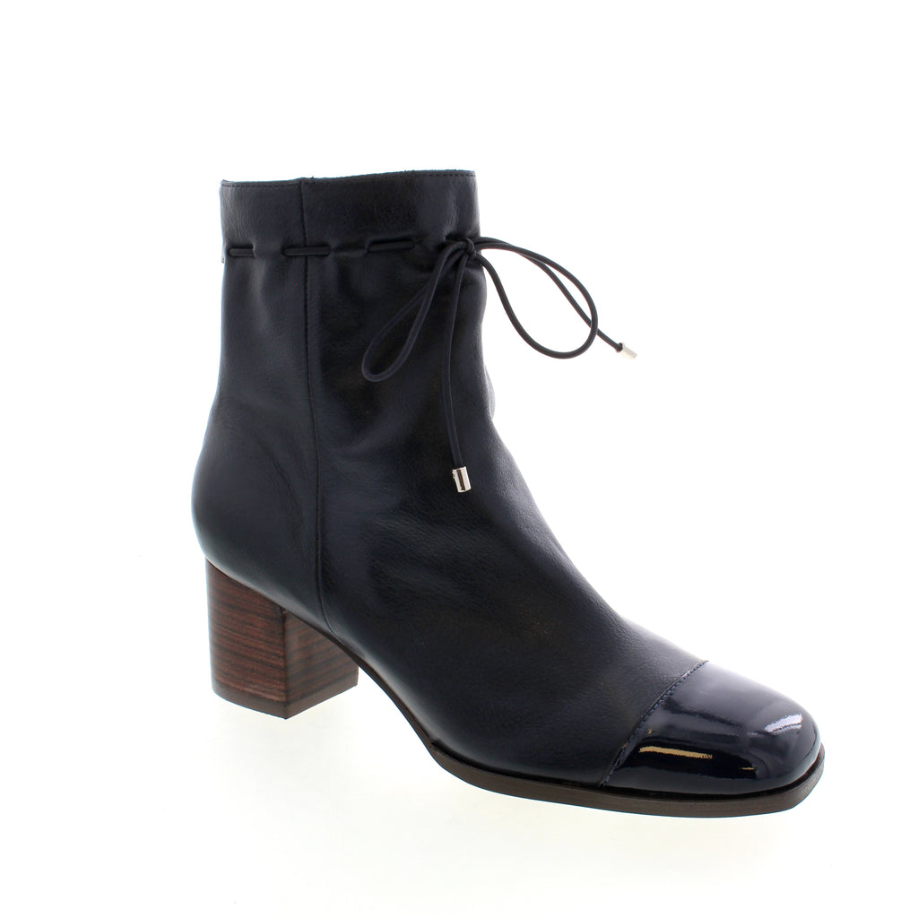 These Django &amp; Juliette Valina ankle boots are crafted from high-quality leather for a chic, elevated look. With a comfortable block heel, laced upper and a back zipper, they easily transition from your 9-5 to evening outings.&nbsp;