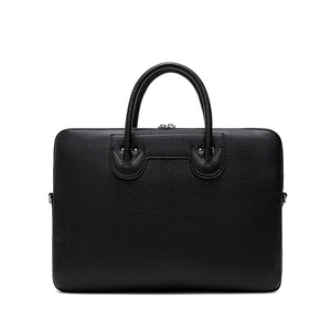 Stunning black vegan leather bag, with silver zipper detail and added adjustable strap.
