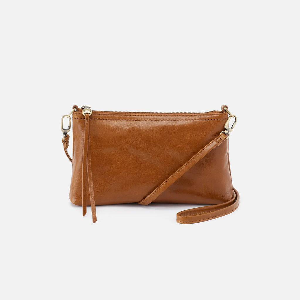 Enhance your style with the versatile Hobo Bags Darcy Crossbody. This bag is perfect for every mood and occasion with its easy convertibility feature. Whether you're on the go or out for the night, Darcy is always your go-to choice. Elevate your look with this stylish and functional bag.