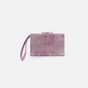 The Hobo Violet Wristlet adds a touch of old-world elegance to any outfit. Crafted from Violet Metallic with a modern kiss-lock frame, this stylish and practical accessory is perfect for your daily essentials.