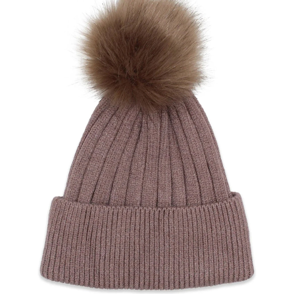 Upgrade your winter wardrobe with the Morgan &amp; Taylor Remi Beanie in Brown. Made from a warm wool-blend, this classic silhouette features ribbed detailing and a cute faux fur pom-pom. Perfect for staying cozy and stylish all winter long.