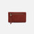 The Hobo Bags Lumen Wallet is expertly crafted for both style and functionality. The exterior features a convenient pocket with a leather tassel zipper pull and a slip pocket for your phone. The interior is thoughtfully designed to hold all of your wallet essentials.