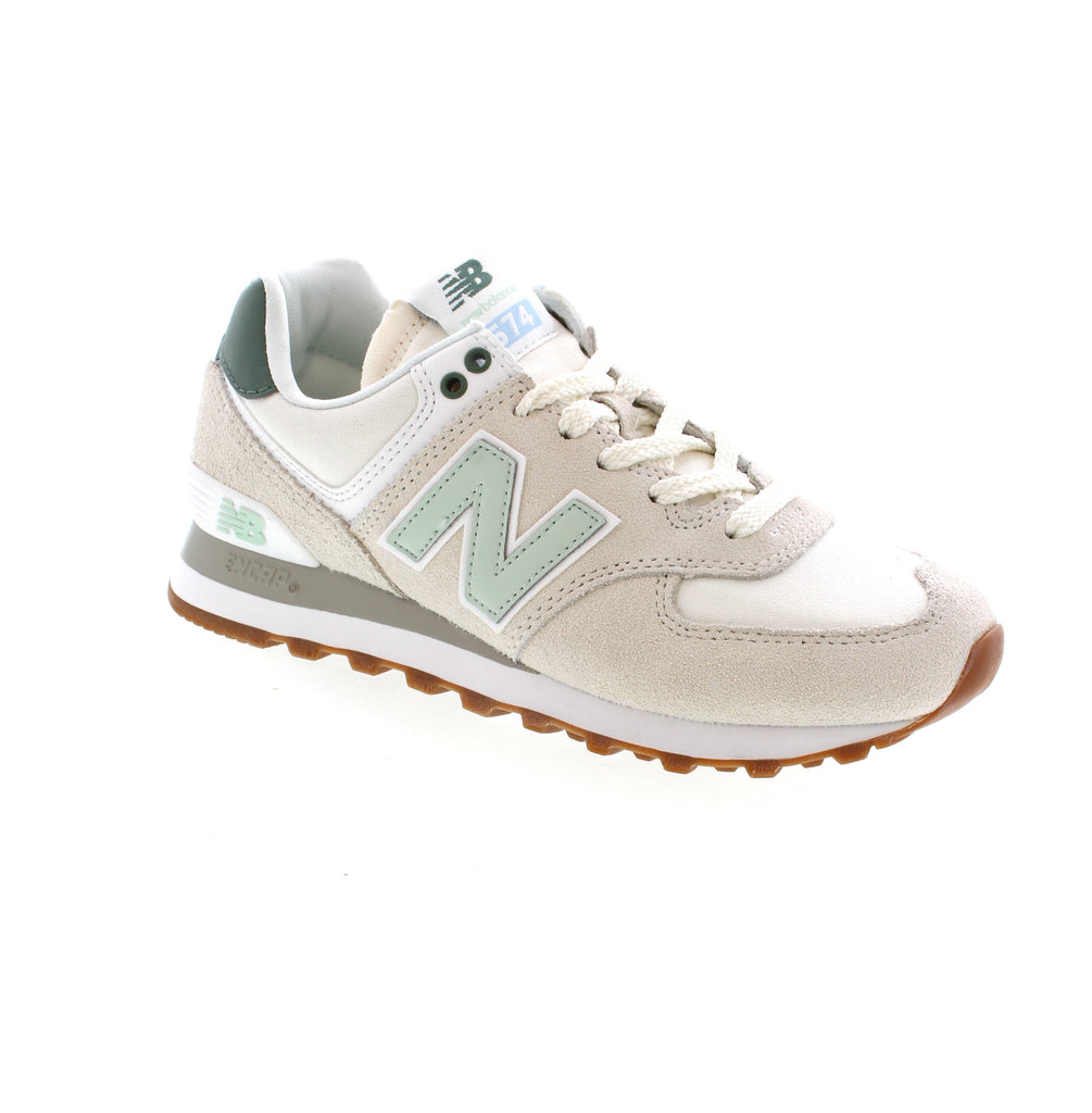 The New Balance U574LV2 in Sea Salt/New Spruce is the ultimate versatile shoe. With its wider last and hybrid road/trail design, it offers a unique mix of comfort, durability, and uncomplicated style. A trusted closet staple, its unassuming versatility has made it an all-time great. Embrace the boundary-defying New Balance style with the 574.