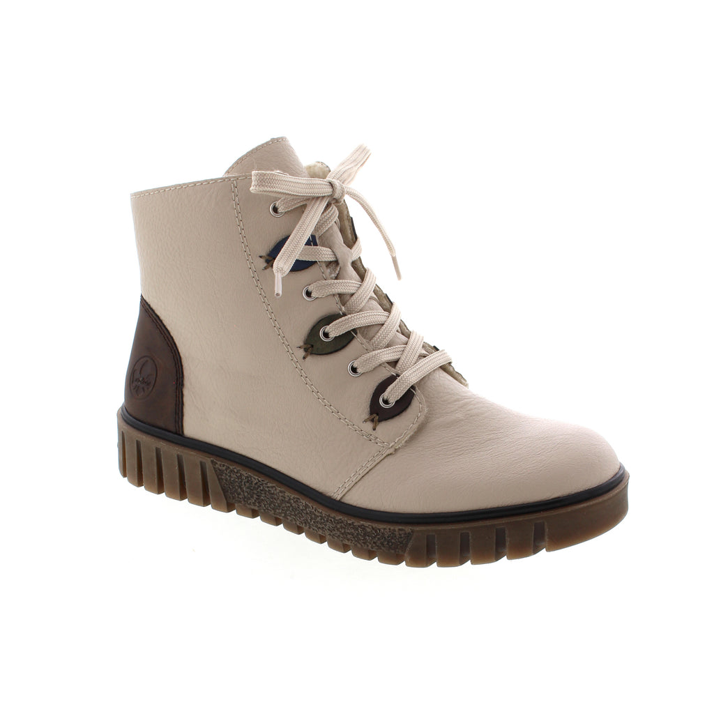 Let the Rieker Y3401-60 - Cream bring winter in style! Crafted with wool lining and insulated for warmth, these women's boots are perfect for casual winter occasions. With lace-up or side-zip closure, and a solid pattern, you'll be sure to look sharp while staying cozy. You can't go wrong with Rieker!