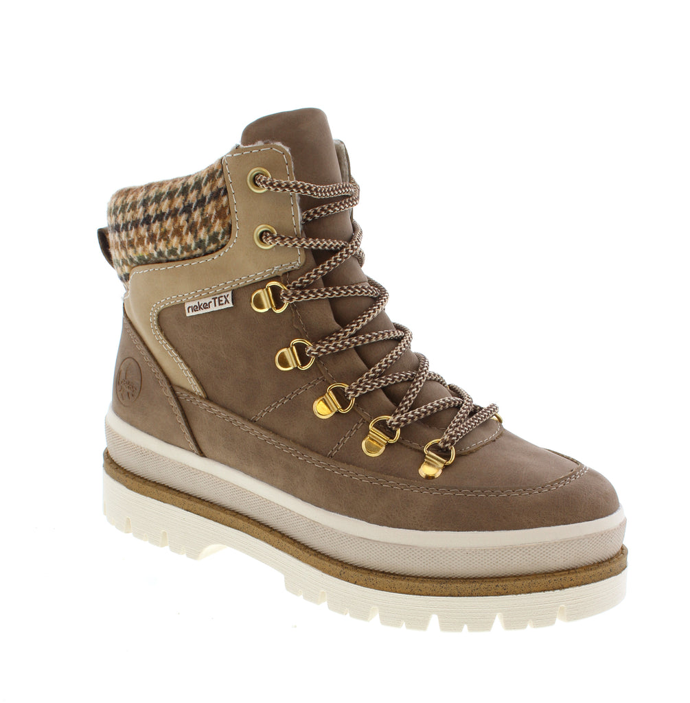 Effortless comfort meets versatile style with the Rieker Y6210-64 in warm beige. This casual ankle boot features a nubuck upper, foam midsole, and rubber outsole designed for everyday wear and light outdoor adventures.