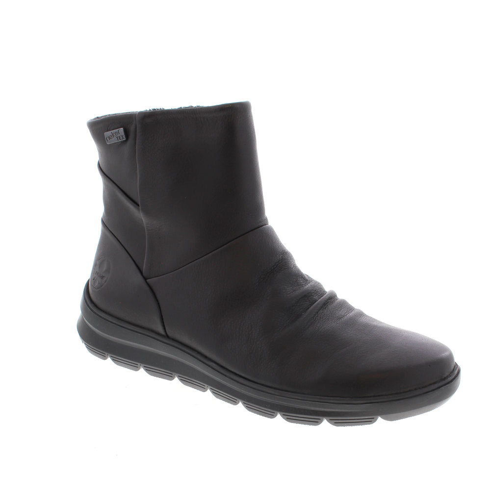 Rieker's L7553-90 bootie combines European craftsmanship with everyday comfort. This navy multi ankle boot features a supple leather upper and water-resistant protection for year-round wear. Leather upper with water-resistant finish keeps feet dry and protected. Microfiber lining and removable insole provide cushioning and support. Foam midsole absorbs impact while the rubber outsole delivers reliable traction. Side zip entry makes on-and-off effortless.