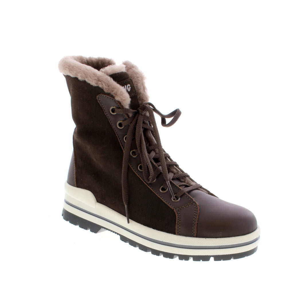 The Olang Zaide in Brown is a versatile winter boot built for cold-weather comfort and performance. Featuring a waterproof suede upper with insulated sheepskin lining, this boot keeps your feet warm and dry through harsh conditions. Designed with practical features including a foam midsole for cushioning, ice slip-resistant rubber outsole for secure footing, and dual entry options with lace-up and side zip closures. The microfiber footbed adds extra comfort for all-day wear. 