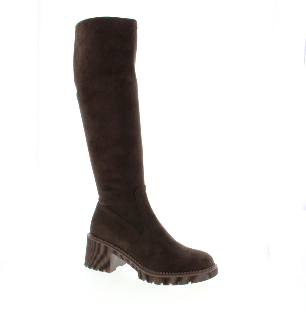 Elevate your everyday style with the Django &amp; Juliet Zina DJ, a versatile knee-high boot designed for comfort and sophistication. Crafted with a rich chocolate suede upper and supported by a cushioned foam midsole, this boot delivers all-day wearability with effortless elegance. Suede upper with fabric lining and man-made leather footbed for comfort. Foam midsole and rubber outsole provide stability and durability. Side zip entry makes getting in and out quick and easy. 