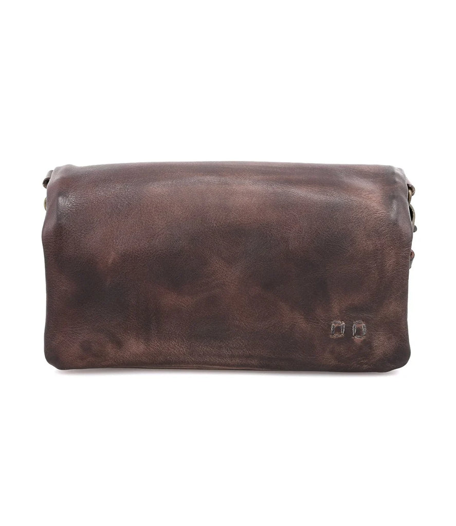 The Bed Stu Cadence is a compact and versatile wallet, crossbody, or clutch. Crafted from buttery soft leather, it features 2 inner zipper pockets, a place for ID and credit cards, and a strong magnetic closure. An outer zipper pocket provides added convenience, making it an ideal everyday accessory, travel companion, and girls' night out essential.