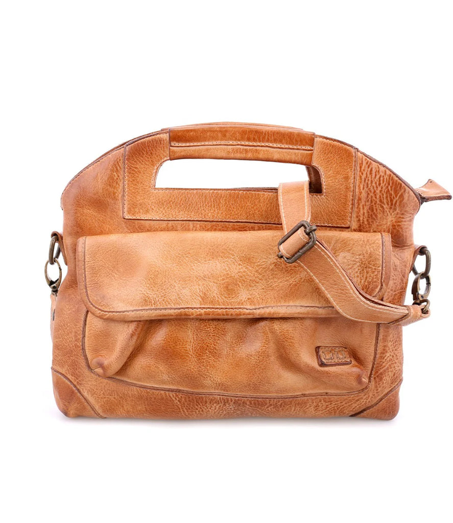 The Greenway by Bed Stu is a full grain leather handbag with optional crossbody strap. The reinforced top handles along with the zip-top closure will keep your essentials protected. This beautiful handmade bag makes an effortless companion for your everyday.