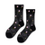 Experience a delicate blend of vintage charm and modern style with the Hansel From Basel Rosebud Sheer Crew Sock in Black. These sheer socks feature a subtle rosebud pattern that adds a touch of sweetness and elegance to any outfit. Inspired by a nostalgic, grandma’s-knitting vibe, they bring a unique softness and grace to your wardrobe. Perfect for pairing with your favorite shoes or wearing as a standout accessory, these socks offer light breathability and a comfortable fit