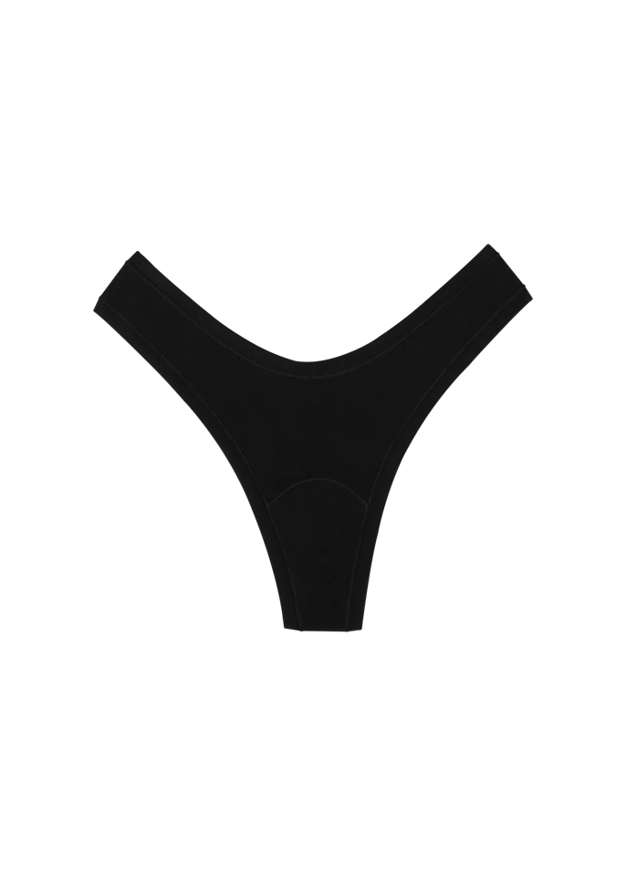 This Huha Dipped Thong is high-rise and sits comfortably at the hips and dips low in the front and back to create a flattering, high-leg V-shape. A wider hip band helps prevent digging or slipping, while the single-layer construction and low-pressure seams deliver an airy, barely-there feel.