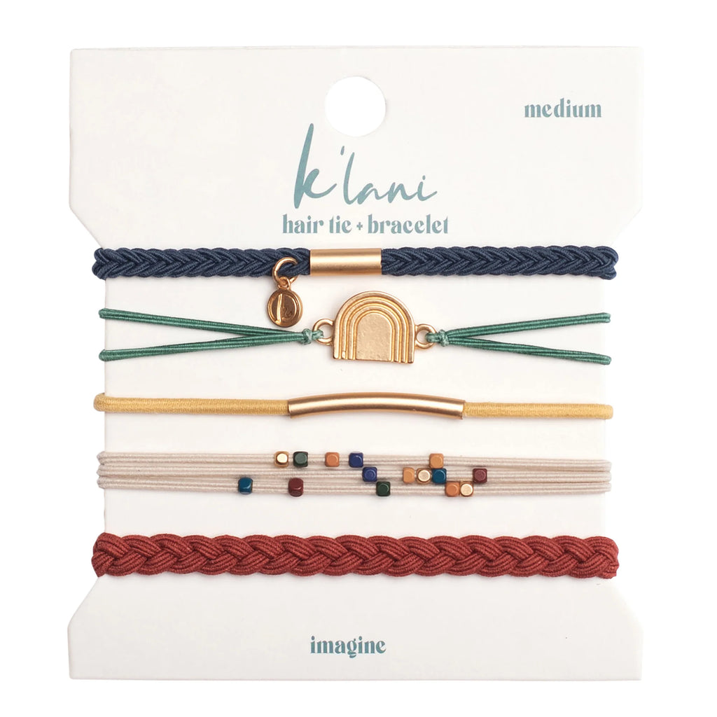 Introducing the K'lani Imagine collection: a curated set of five hair tie bracelets featuring vibrant sun-inspired tones in blue, green, yellow, and red, paired with an elegant cream bracelet adorned with multicolored beads. Each piece is anchored by a golden rainbow charm—a symbolic reminder of optimism and the promise that follows life's storms. Perfect for those who appreciate both functionality and meaningful design.