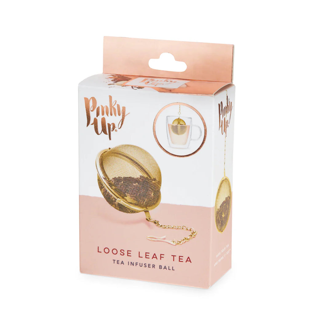 Don't let its compact size fool you this gold tea ball packs serious brewing power. Simply fill it with your favorite loose leaf tea, hook it onto your mug or glass, and let the magic happen. At just 1.8 inches in diameter, it's the perfect sidekick for tea lovers who refuse to compromise on flavor. Whether you're steeping delicate florals or robust chai blends, this timeless accessory makes loose leaf brewing effortless and mess-free. A must-have for anyone serious about their tea ritual.