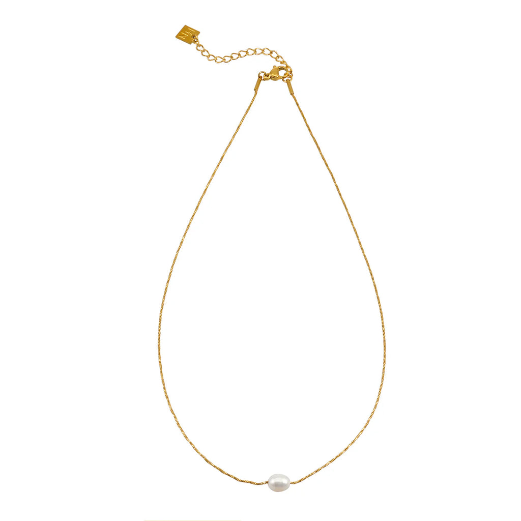 Delicate gold necklace featuring a genuine freshwater pearl pendant on a textured chain. The adjustable 16" + 2" extender length makes it versatile for layering or wearing alone. Hypoallergenic and nickel-free, this lightweight piece transitions effortlessly from everyday wear to special occasions.