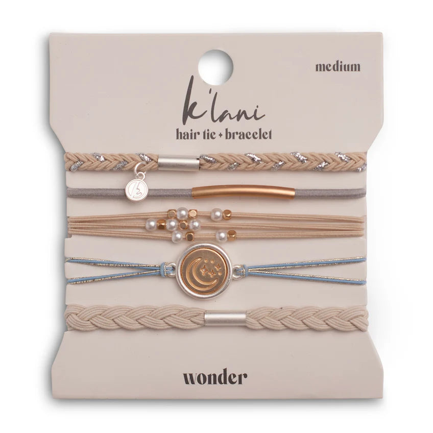 This versatile five-piece hair tie bracelet collection features a curated selection of light neutral tones—pearls, golds, and silvers—designed to complement any jewelry wardrobe. Each bracelet combines functional styling with celestial charm details, including moon and star accents that evoke a sense of wonder. The coordinated palette ensures seamless mixing and matching for both everyday wear and special occasions.