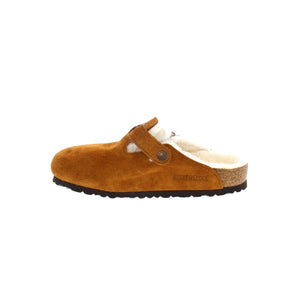 The signature slip-on clog from Birkenstock. The Boston shearling is crafted from lambskin to keep your feet warm with an anatomically contoured cork/latex footbed. This classic and comfortable design has an adjustable strap across the vamp with buckle closure.