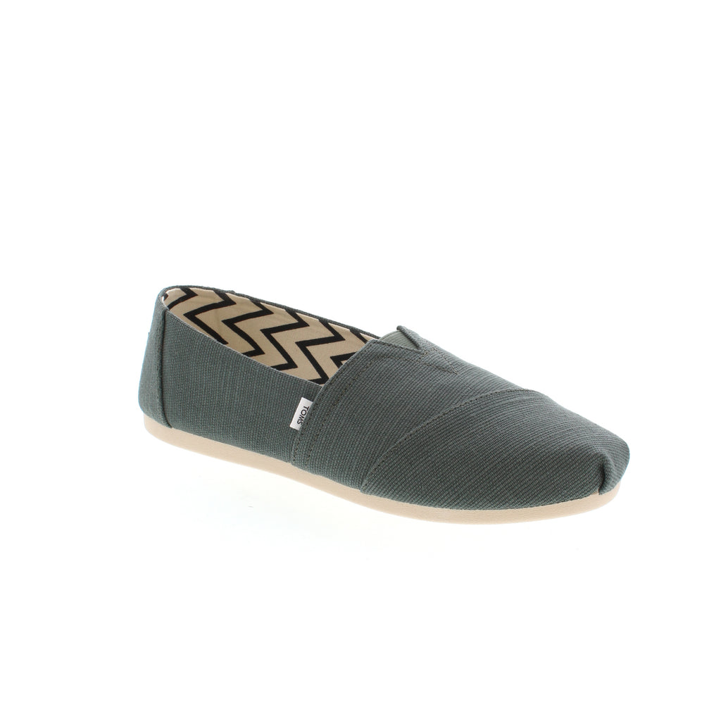 Toms Classic Alpargata Slip-On is easy on your feet and light on the earth - perfect for all-day, everyday wear.