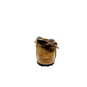 The Birkenstock Lugano sandal is designed with four straps with adjustable buckles and is made from high-quality oiled leather for a natural, rustic design. An anatomically shaped cork-latex footbed keeps your feet supported all day. 