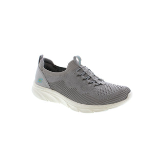 Skechers D'Lux Comfort slip-on features a soft knit, synthetic upper, stretch laces, Skechers Air-Cooled Memory Foam® insole and a well-cushioned D'Lux Comfort midsole for the perfect balance of style and comfort. 
