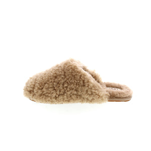 UGG Maxi Curly Slide slipper features a curly sheepskin upper lined in UGGplush™ wool blend and finished with a molded rubber sole to bring you traction if you're running to the mailbox!
