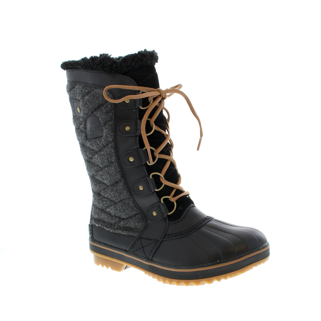 Experience the ultimate combination of style and functionality with the Tofino™ II by Sorel. This waterproof boot is designed to keep your feet dry and warm, featuring a removable footbed and luxurious faux fur details. Prepare to make a statement in both fashion and function with this must-have boot!