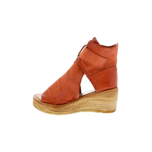 This wedge sandal is designed with a smooth leather upper and features a zippered ankle strap - perfect for a night out on the town or a shopping spree! 