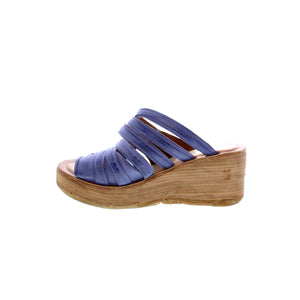 This wedge sandal is designed with a smooth leather upper and features a zippered ankle strap - perfect for a night out on the town or a shopping spree! 