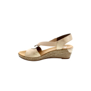 This open-toe wedge sandal from Rieker features two elasticated straps that weave through a silver disc for easy on/off. The silver disc provides an elegant decorative accent. Designed with a lightly cushioned insole for all-day comfort and a durable, flexible, lightweight rubber outsole that delivers shock-absorbing traction. 