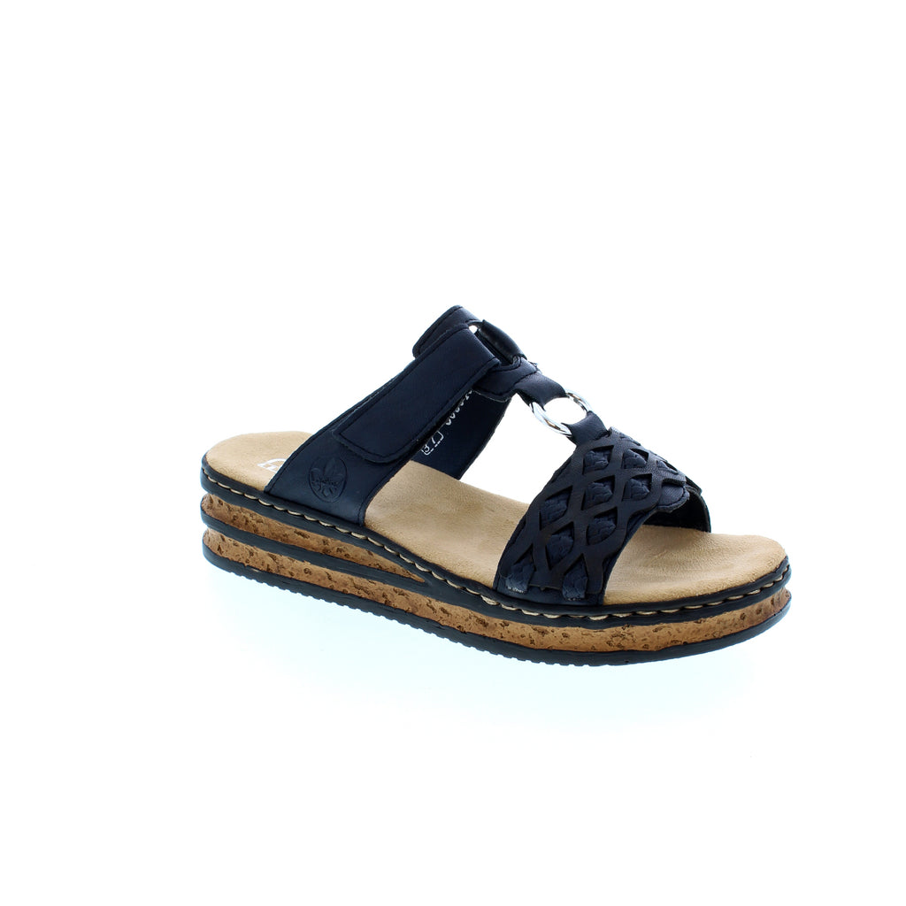 This slide sandal features a beautifully designed upper with an adjustable velcro strap. These sandals are built with a supportive footbed to keep your feet comfortable while you take a stroll or are spending the day at the beach. 