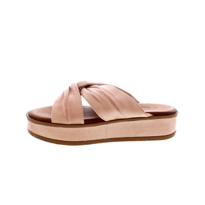 This flatform slide sandal is wrapped in leather with beautiful ruching and knot detailing to keep your feet looking their best! 
