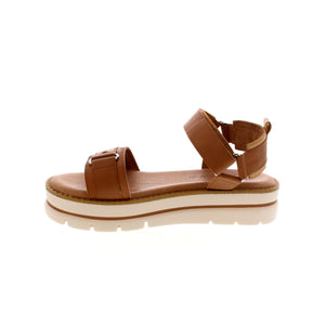 This flatform strappy sandal is wrapped in leather with adjustable velcro straps and a leather footbed for a comfortable, fashion-forward, everyday design. 