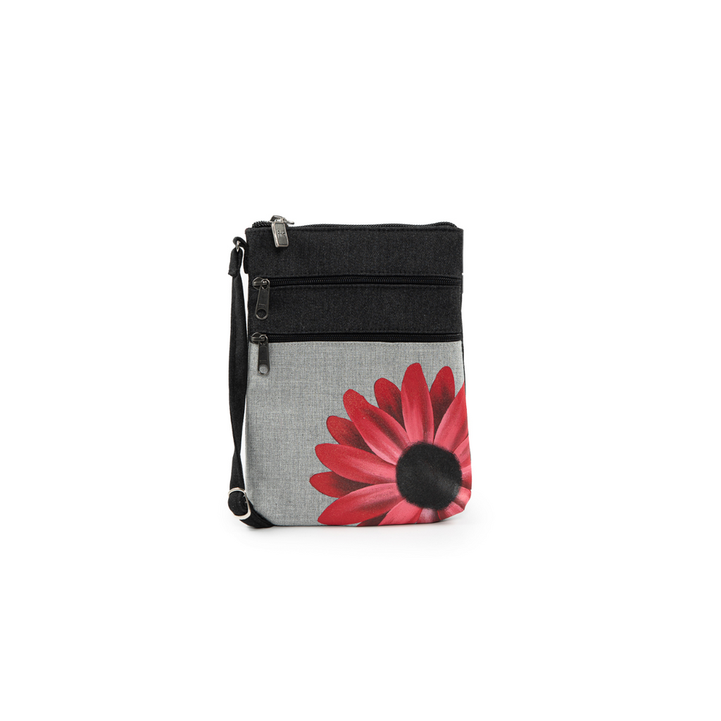 Jak's Grab and Go Pouch crossbody bag brings organization in a fun and stylish way! This bag features zippered organizer pockets to keep your belongings safe and in their place!
