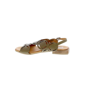 This exquisite sandal is a must-have for any fashionista. The circular scalloped laser cut detail offers a unique design, while the leather lining and adjustable ankle strap keep the feet comfortable and secure all day. The perfect accompaniment to any summer style, Bueno Avril is the ideal choice for a chic, effortless look. 