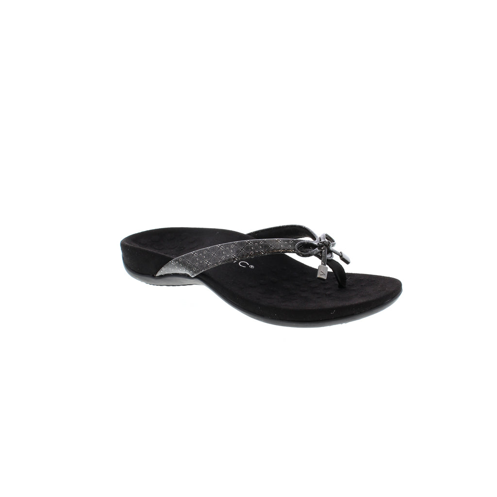 The Vionic Rest Bella sandal offers prime cushioned comfort and eye-catching style with its orthopedic footbed, arch support, and stylish bow detailing. Reliable stability and long-lasting support guarantee all-day comfort.