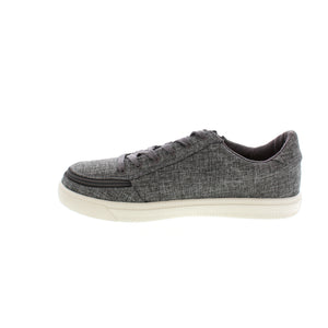 Billy Classic Lace sneaker features a wraparound zipper for quick on and off. These sneakers offer a roomy fit and are crafted from chambray linen and canvas lining, have removable insoles for a customizable fit, and feature a rubber outsole for traction. 