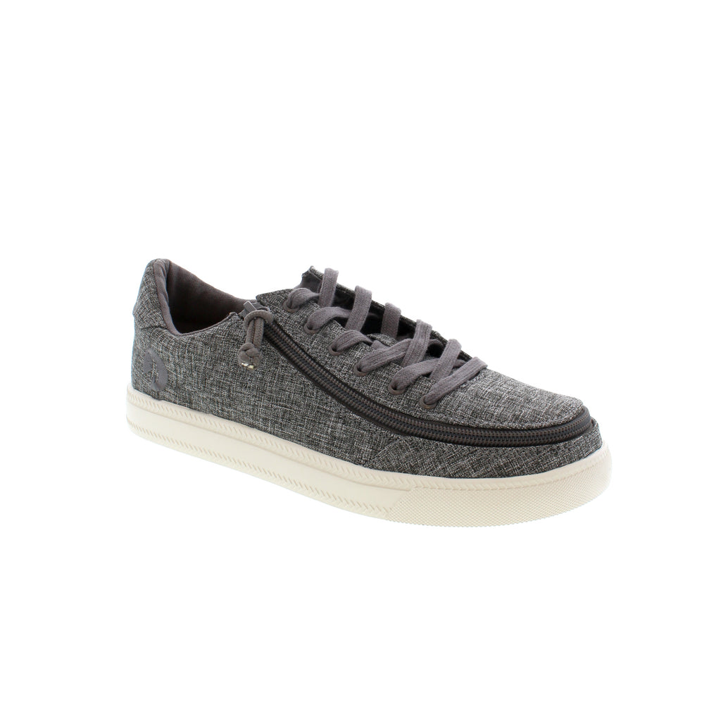 Billy Classic Lace sneaker features a wraparound zipper for quick on and off. These sneakers offer a roomy fit and are crafted from chambray linen and canvas lining, have removable insoles for a customizable fit, and feature a rubber outsole for traction. 