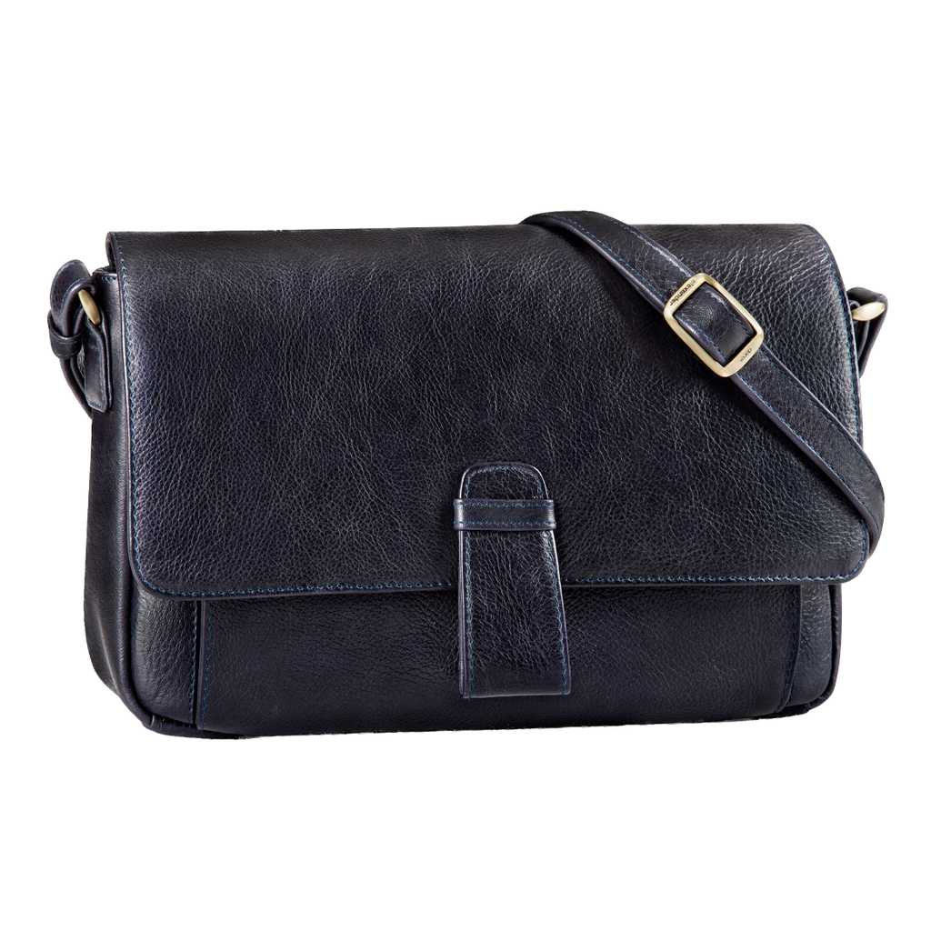 Grab your satchel and go! The beautifully designed leather purse features a magnetic flap to keep all of your belongings safe. With pockets galore and an adjustable shoulder strap and cell phone pocket, this purse will be on repeat!