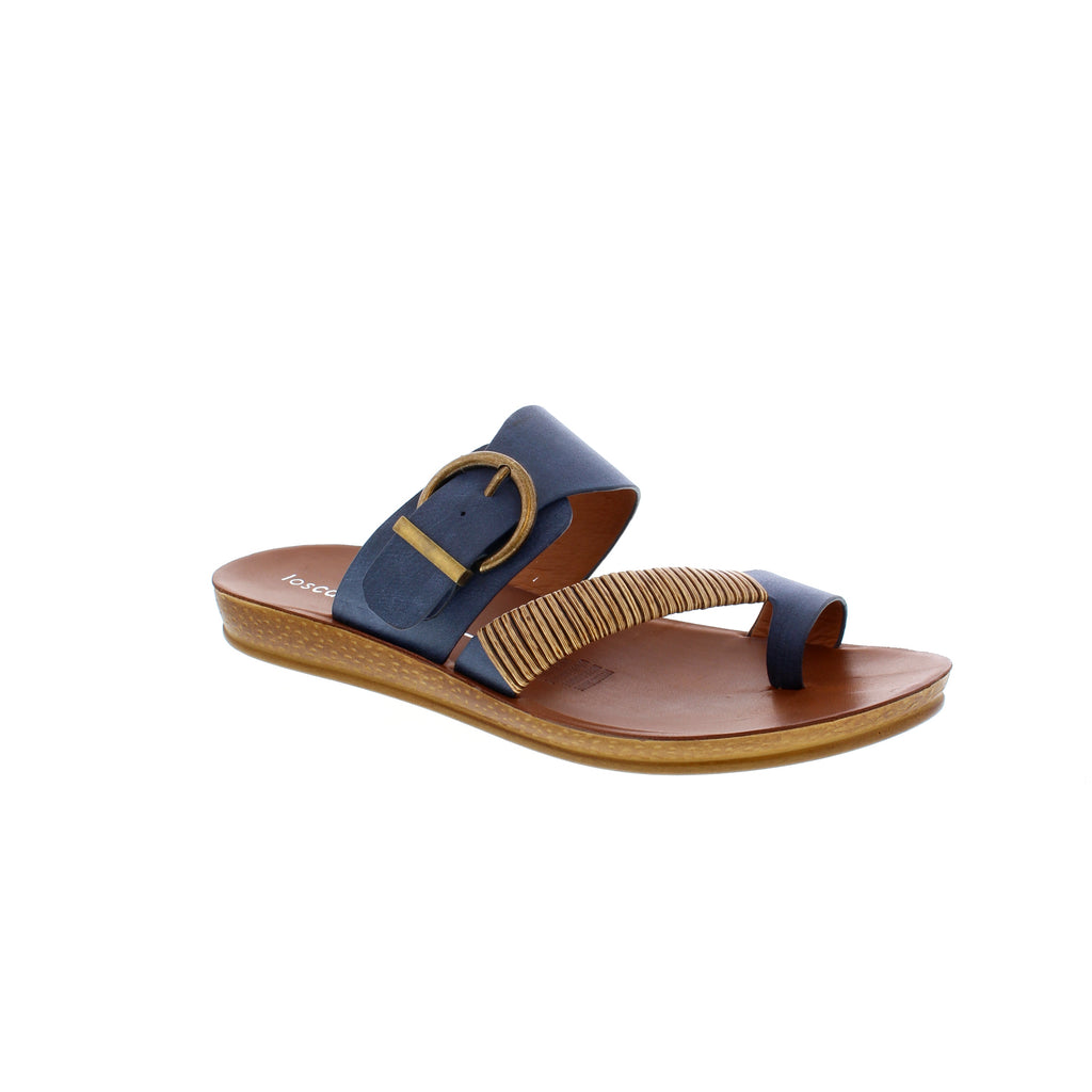 Experience the carefree vibes of Los Cabos Bria sandals. Slip into effortless style with a bamboo-wrapped toe strap, complemented by an antique round buckle on the back strap. Perfect for vacations, strolls on the beach, or on-the-go moments, these sandals add a touch of natural beauty to any outfit.