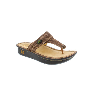 The Carina thong sandal features a beautifully designed upper with an adjustable buckle strap. With a classic mild rocker outsole and supportive footbed to keep your feet comfortable while you take a stroll or are spending the day at the beach. 