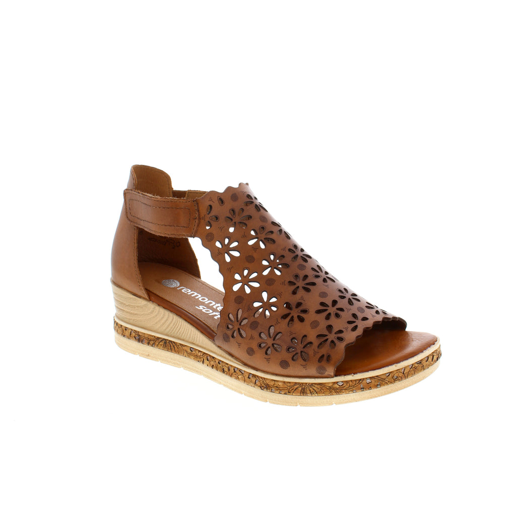This gorgeous gladiator-style wedge features a leather floral cut-out upper. With a velcro adjust, lightweight, shock-absorbing, moisture control and an elasticated insert on the strap for additional comfort to keep your feet looking and feeling beautiful. 